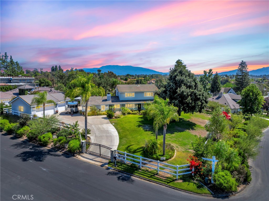a view of a garden with a houses