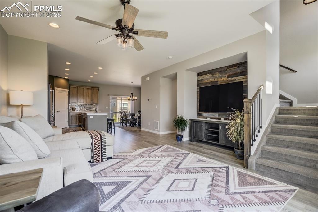 1325 Sunshine Vly Way Colorado Springs, CO 80921 - Photo 18 of 45 a living room with furniture and a flat screen tv