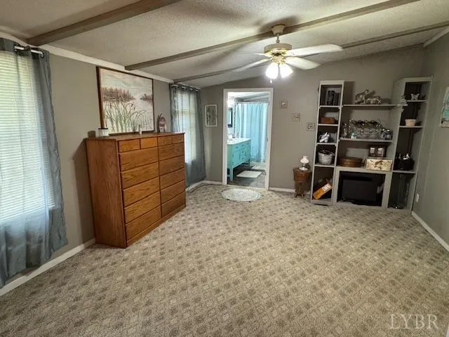 a spacious bathroom with a sink a mirror and a bathtub