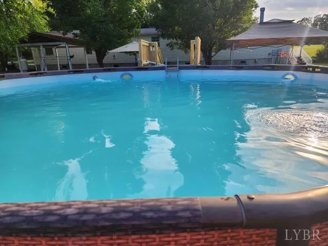 a view of swimming pool with lake view