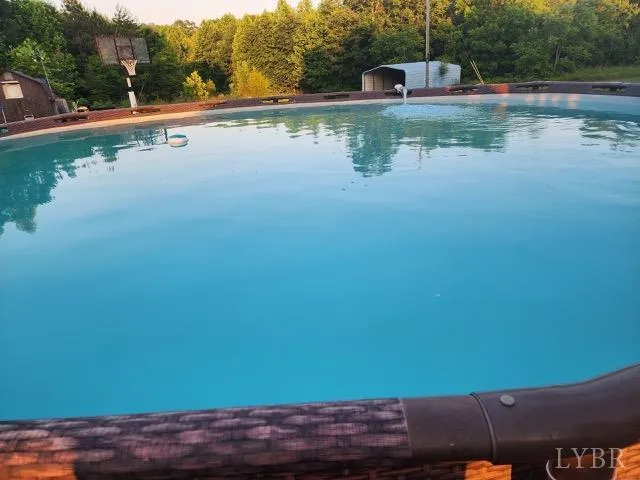 a view of a small kitchen and wooden floor
