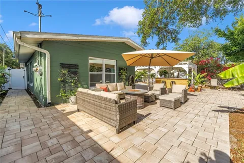 a view of a backyard of the house