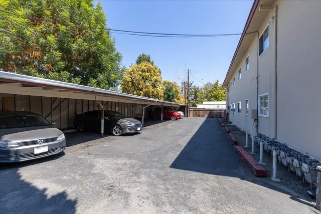 a view of a car in front of a house