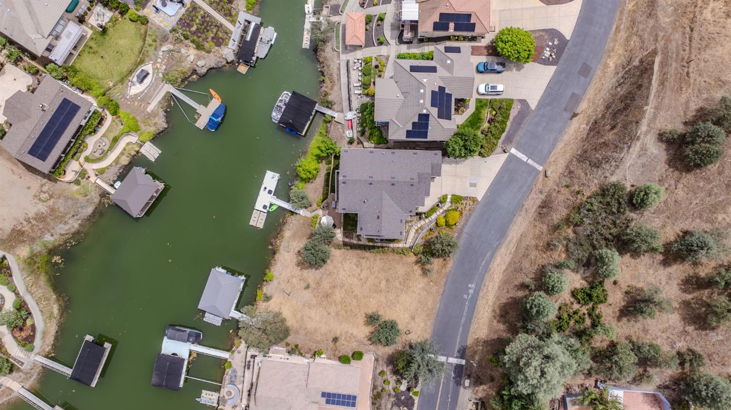 6066 Bluff View Road Copperopolis, CA 95228 - Photo 9 of 96 an aerial view of houses with outdoor space