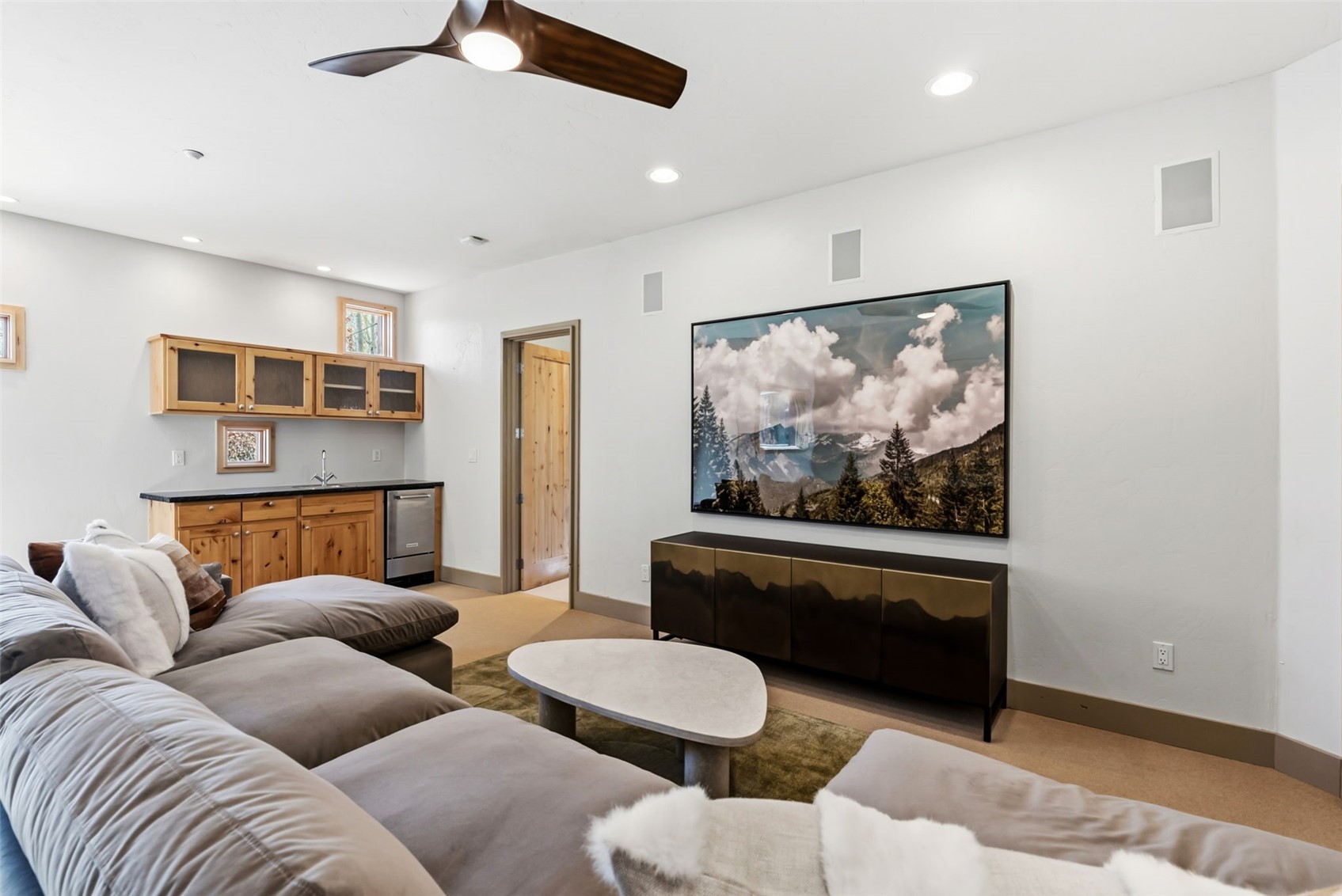 2800 Hunter's Knob Road Silverthorne, CO 80498 - Photo 18 of 37 a living room with furniture and a painting on the wall