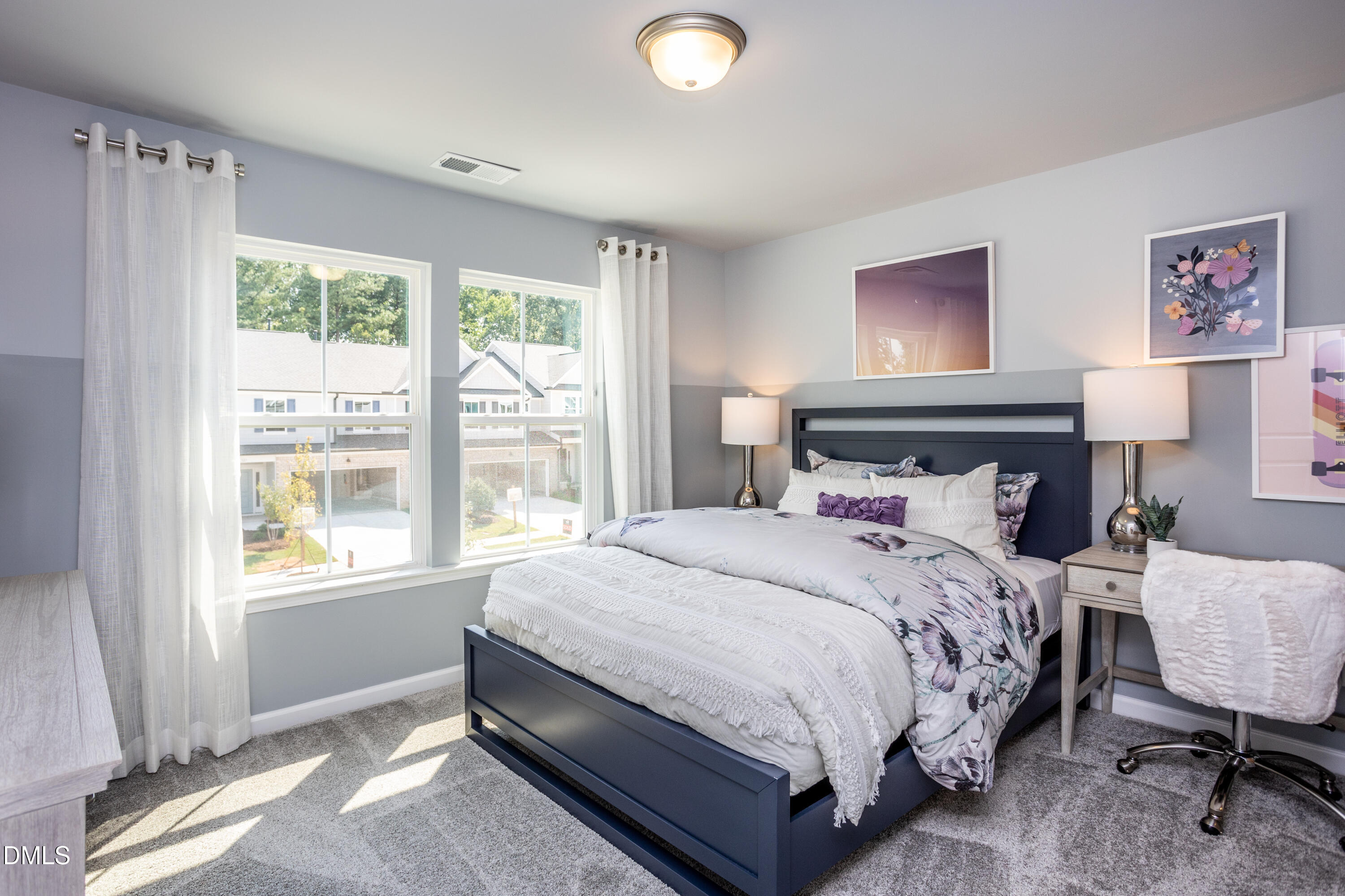 2847 Rodeo Court Fuquay-Varina, NC 27526 - Photo 15 of 22 a bedroom with a bed lamp and window
