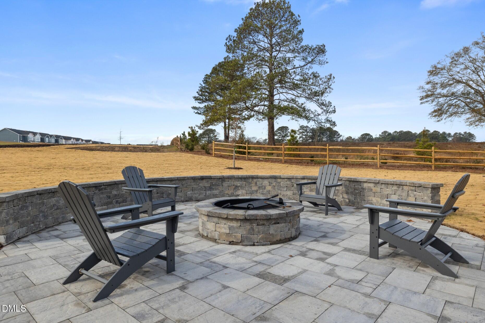 2847 Rodeo Court Fuquay-Varina, NC 27526 - Photo 19 of 22 a view of a terrace with outdoor seating and ocean view