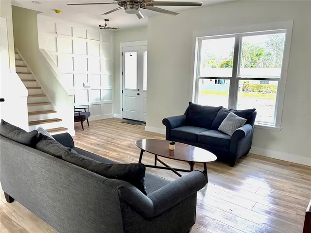 a living room with furniture and a couch