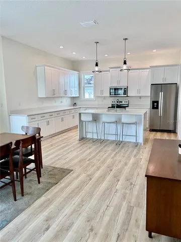 a view of a dining room with furniture