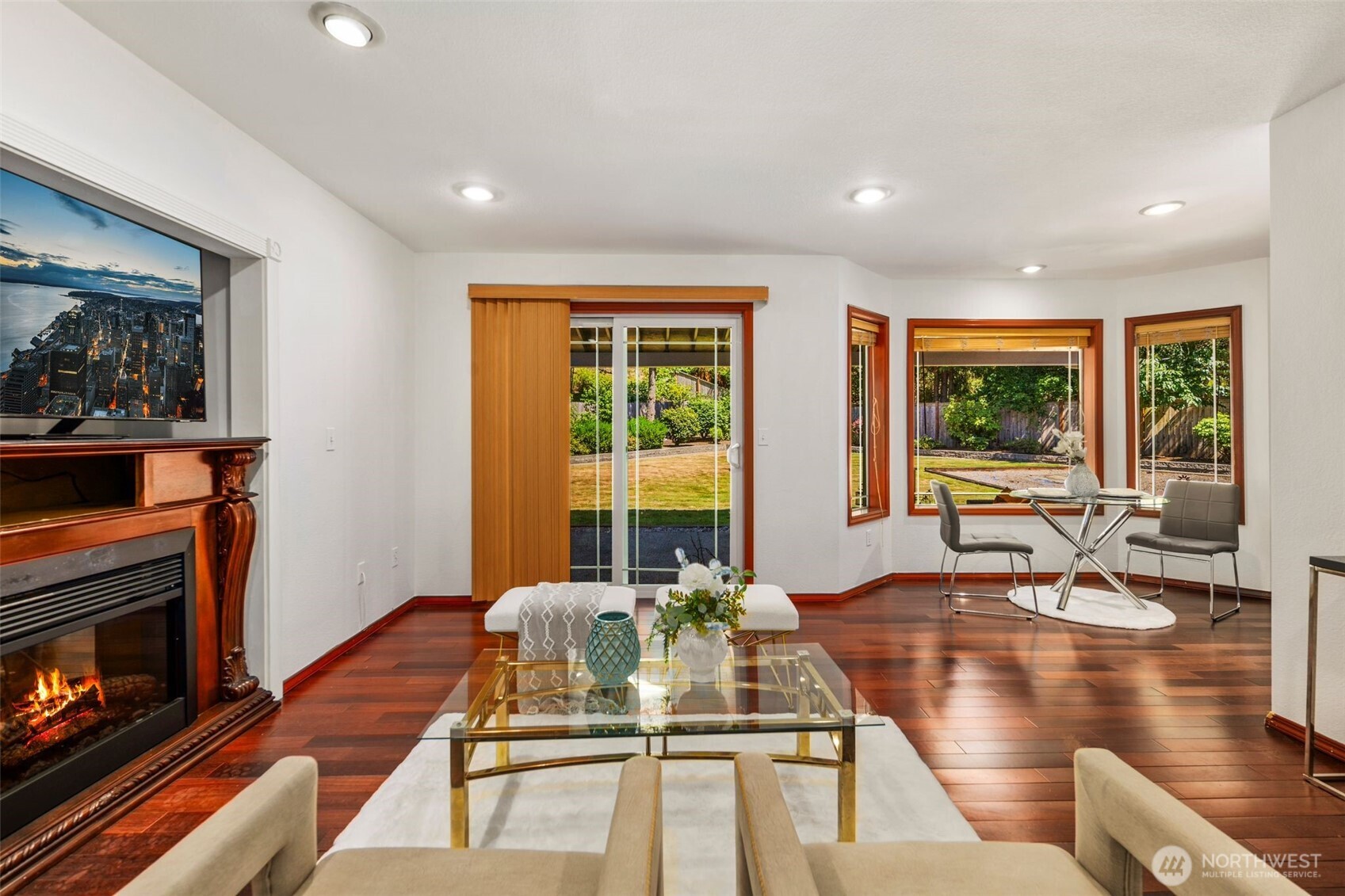 14015 Southeast 156th Court Renton, WA 98058 - Photo 19 of 36 a living room with fireplace furniture and a large window