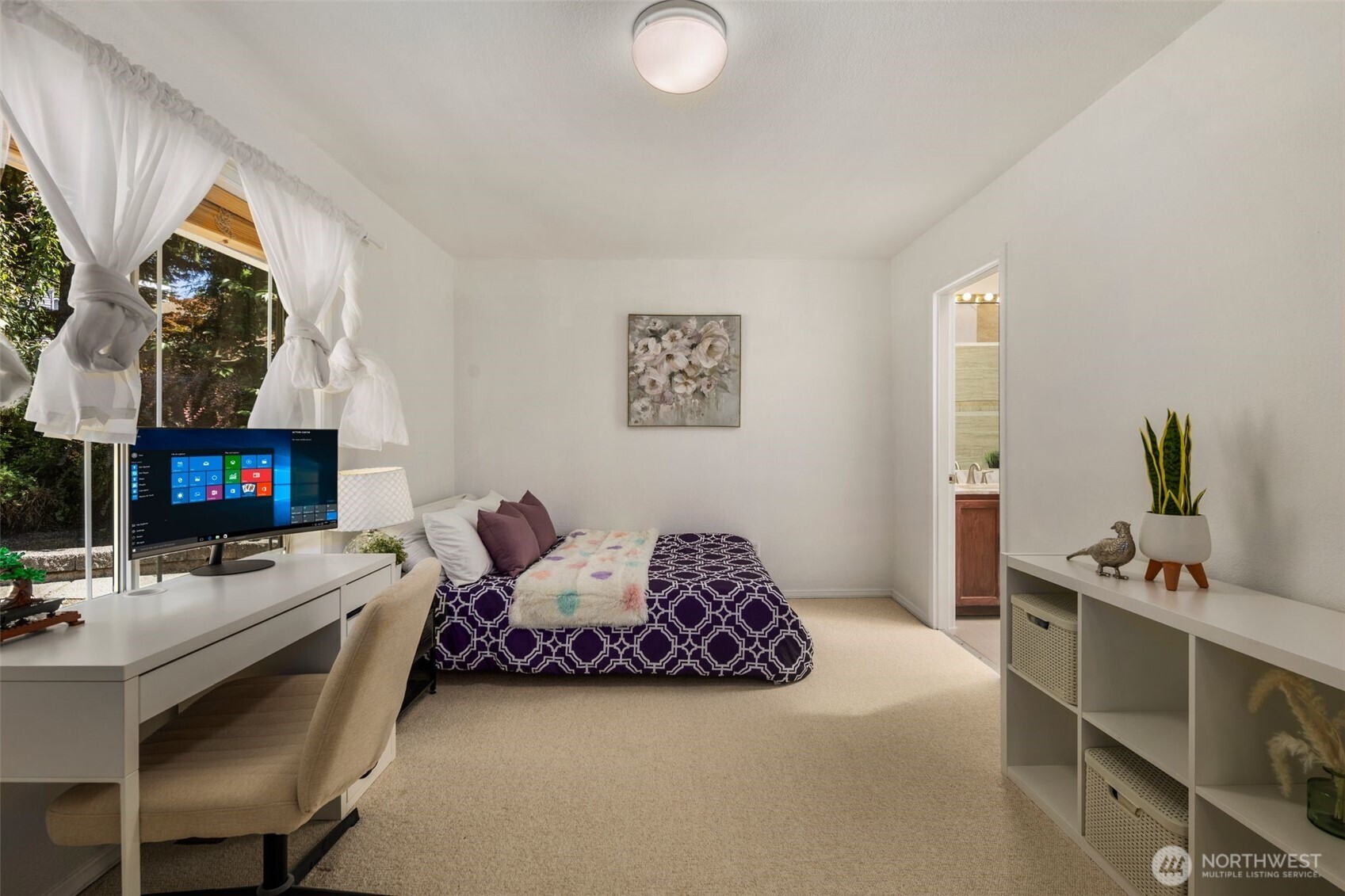 14015 Southeast 156th Court Renton, WA 98058 - Photo 21 of 36 a bedroom with furniture and a flat screen tv
