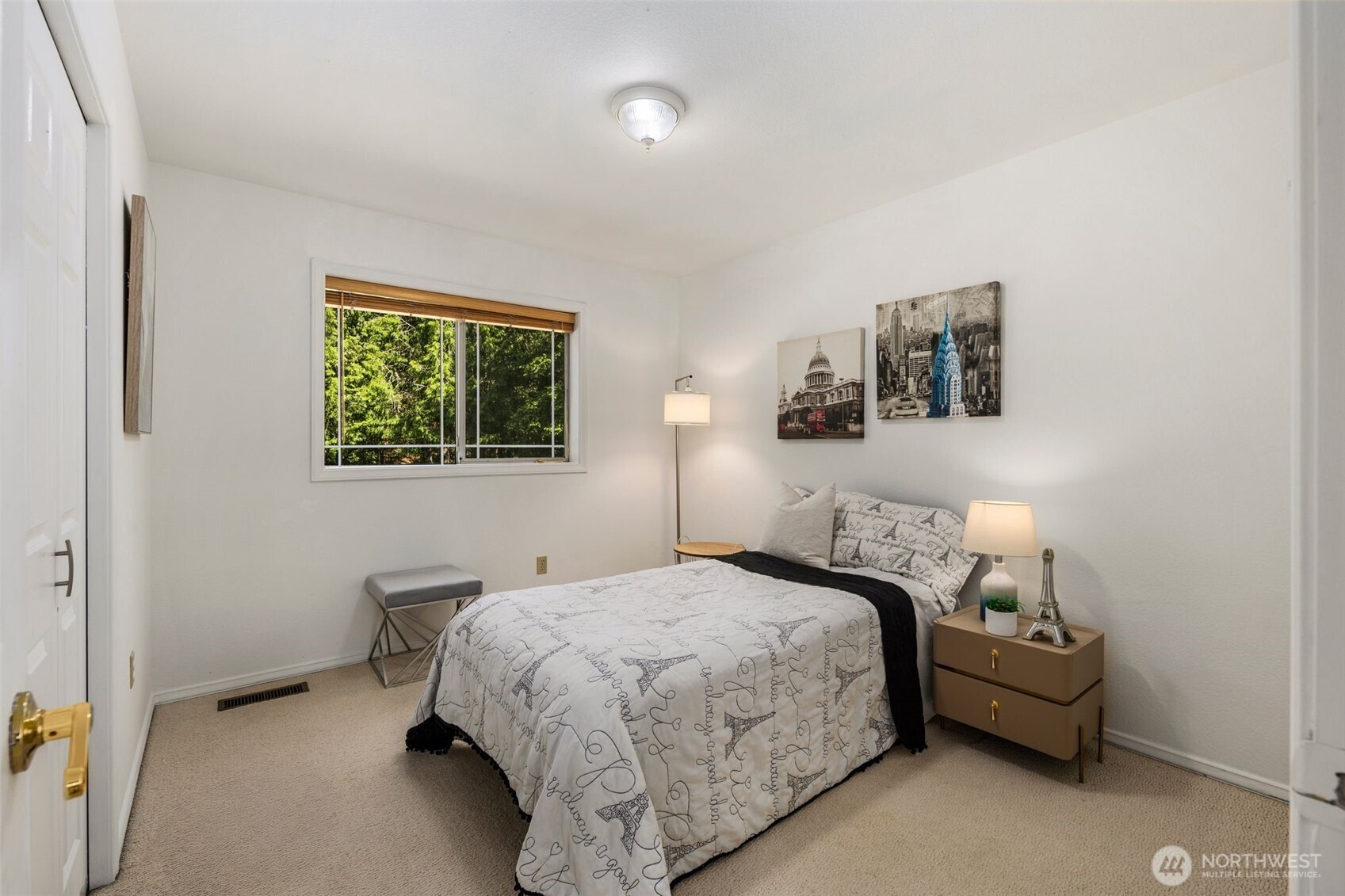 14015 Southeast 156th Court Renton, WA 98058 - Photo 24 of 36 a bedroom with a bed and a lamp on dresser