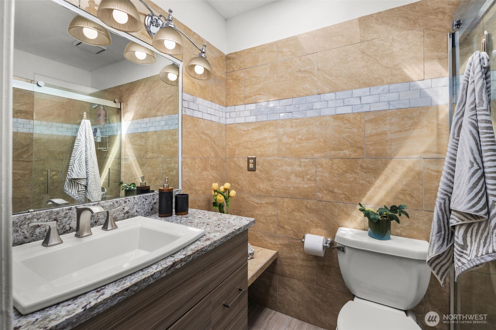 14015 Southeast 156th Court Renton, WA 98058 - Photo 26 of 36 a bathroom with a granite countertop sink a toilet a mirror and shower