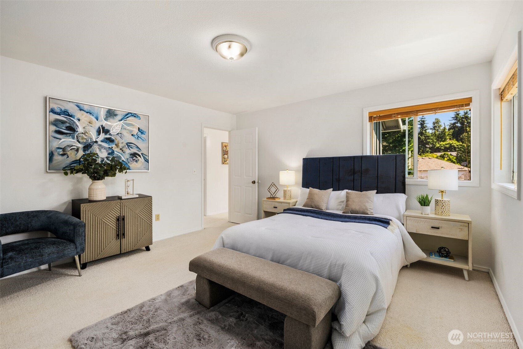 14015 Southeast 156th Court Renton, WA 98058 - Photo 27 of 36 a bedroom with a bed and a couch