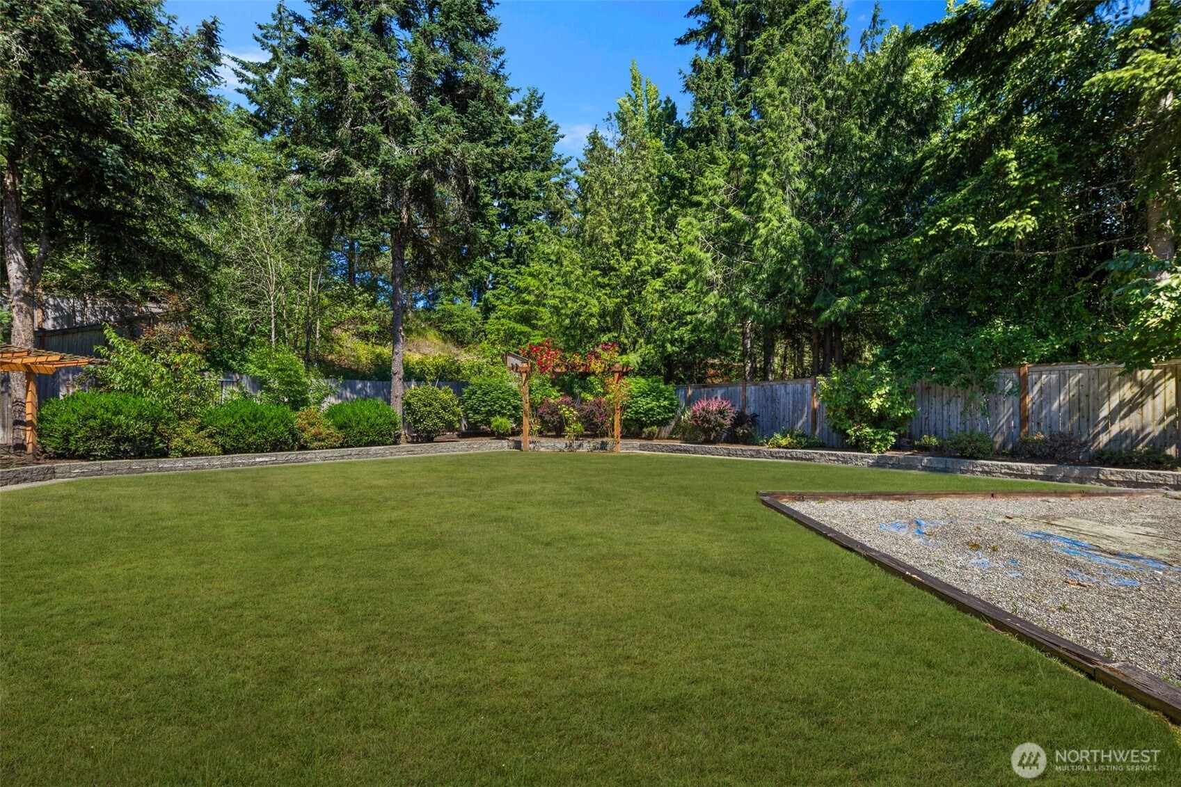 14015 Southeast 156th Court Renton, WA 98058 - Photo 32 of 36 a view of a yard with a house