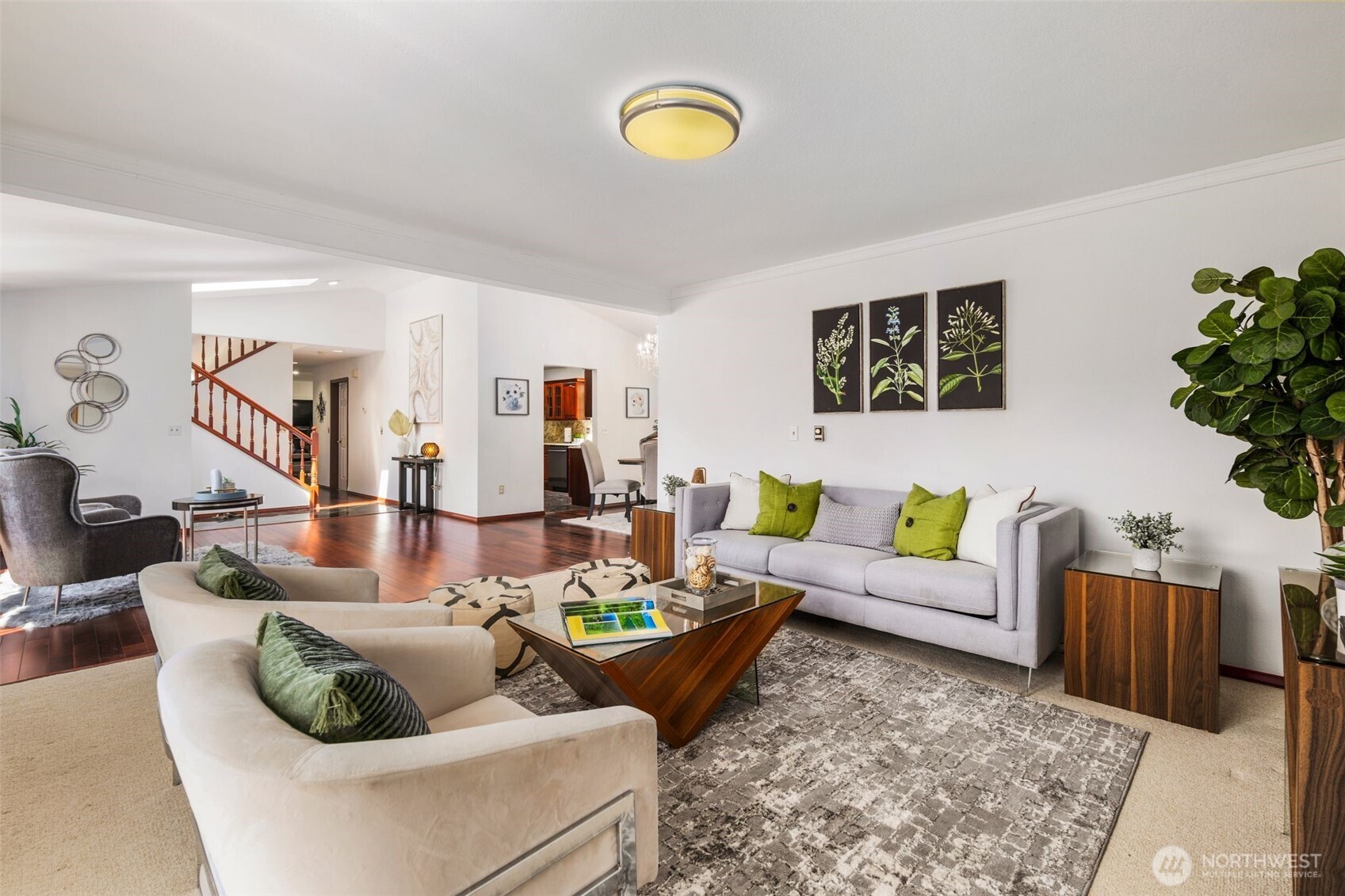 14015 Southeast 156th Court Renton, WA 98058 - Photo 6 of 36 a living room with furniture and painting on the wall