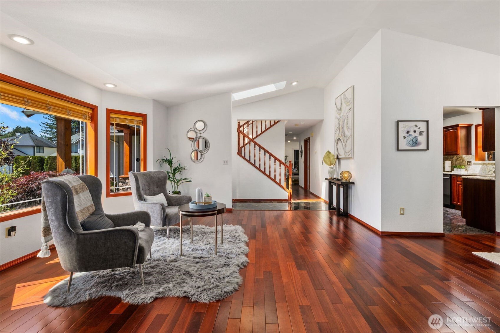 14015 Southeast 156th Court Renton, WA 98058 - Photo 7 of 36 a living room with furniture and wooden floor