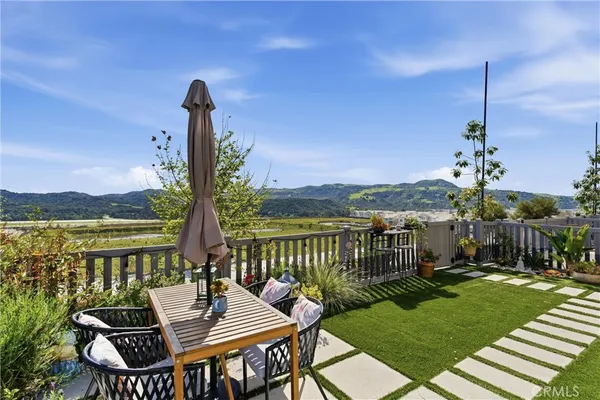 a view of a balcony with lake view and mountain view