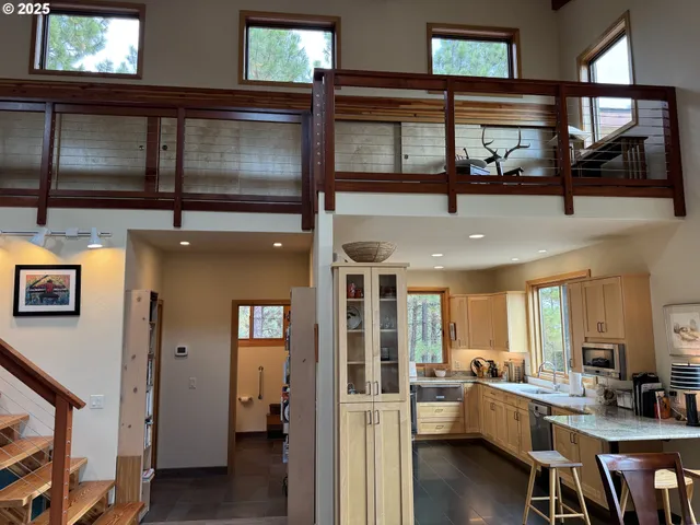 a view of a living room and dining room