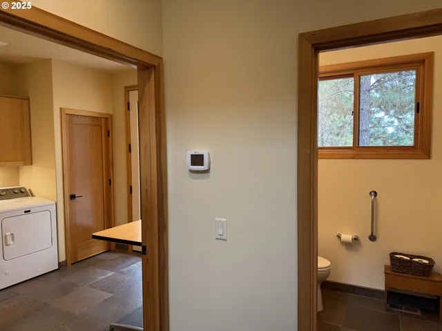 a view of bathroom with a tub shower and a sink