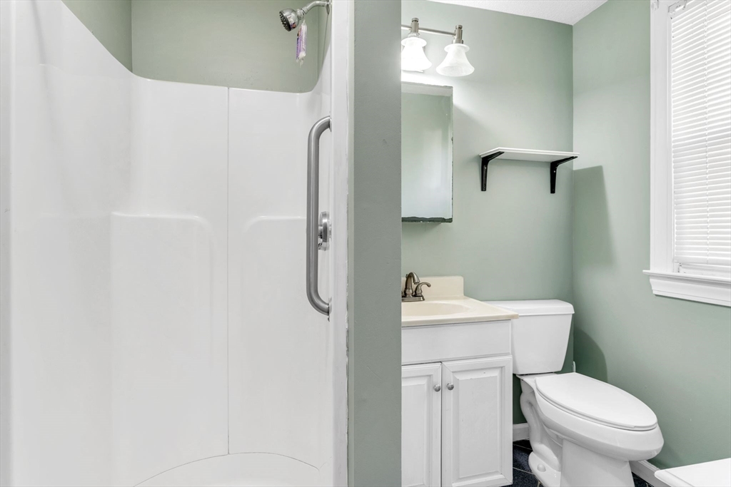 164 Phoenix Terrace Springfield, MA 01104 - Photo 15 of 39 a bathroom with a sink toilet and shower