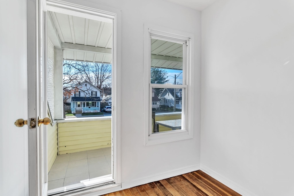 164 Phoenix Terrace Springfield, MA 01104 - Photo 21 of 39 an entryway with wooden floor and a window