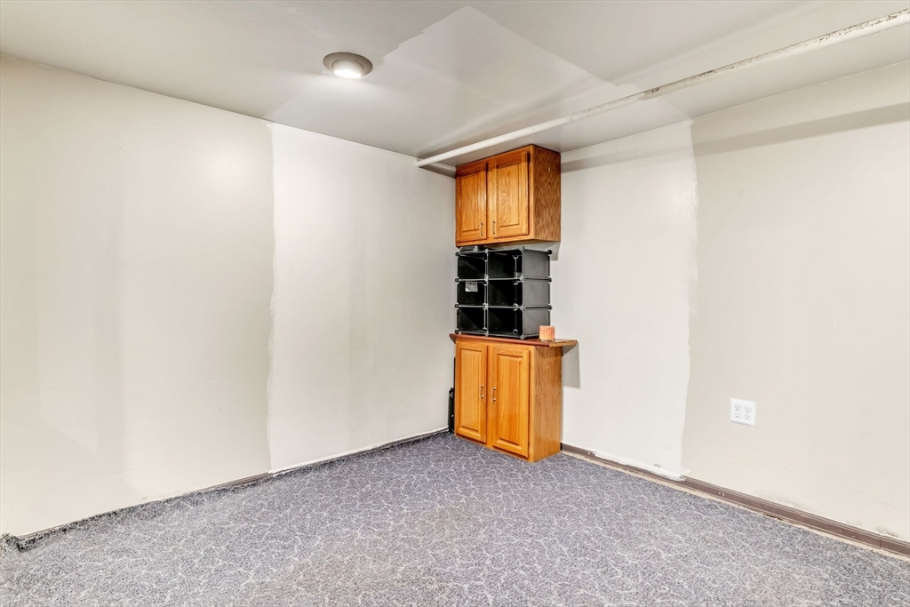 164 Phoenix Terrace Springfield, MA 01104 - Photo 32 of 39 an empty room with windows