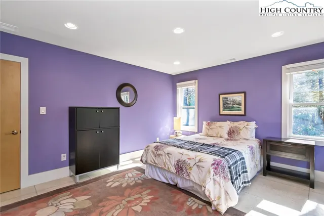 a view of small house with wooden floor and outdoor seating