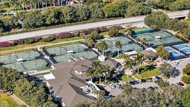 an aerial view of a house with outdoor space