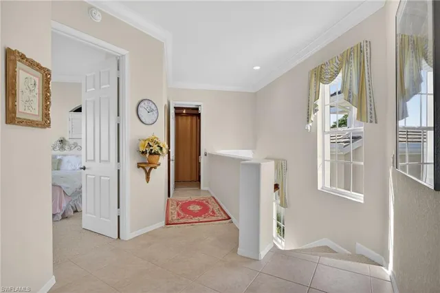a living room with furniture and a piano