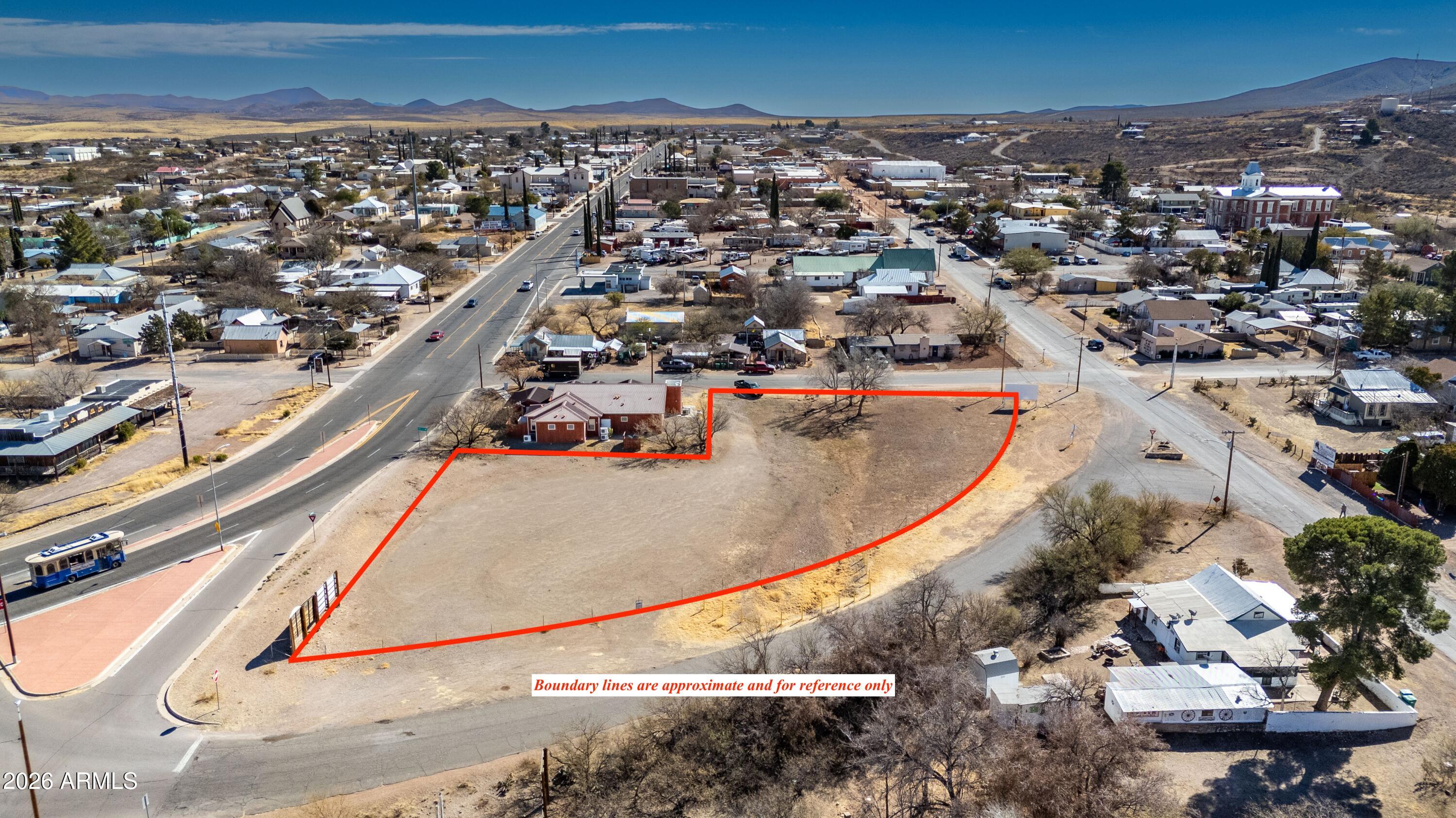 2 South Sumner Street, Unit 26 28 Tombstone, AZ 85638 - Photo 10 of 11 an aerial view of a residential houses with a swimming pool