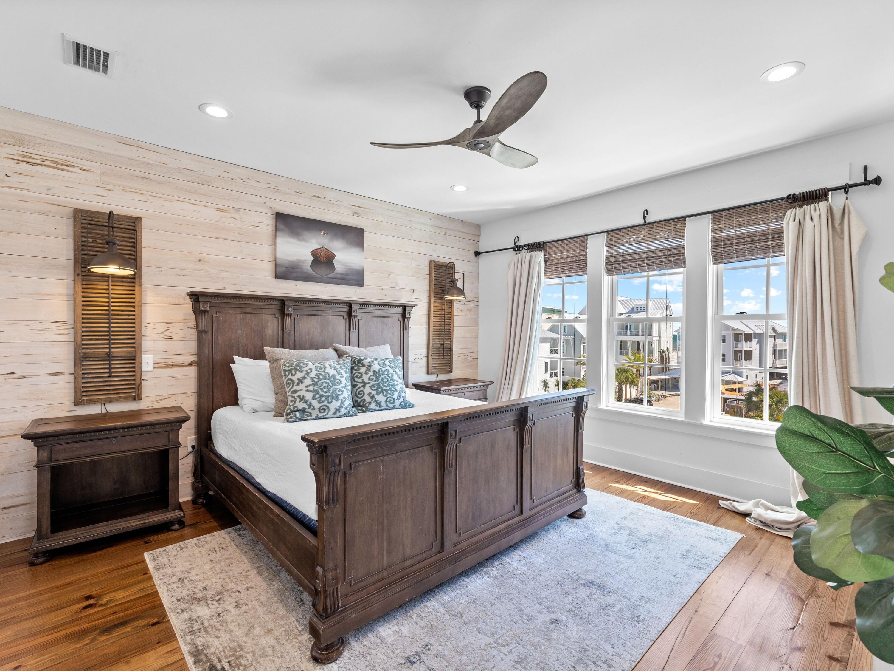 113 Dunes Estates Boulevard Santa Rosa Beach, FL 32459 - Photo 19 of 35 a living room with a bed furniture and a large window