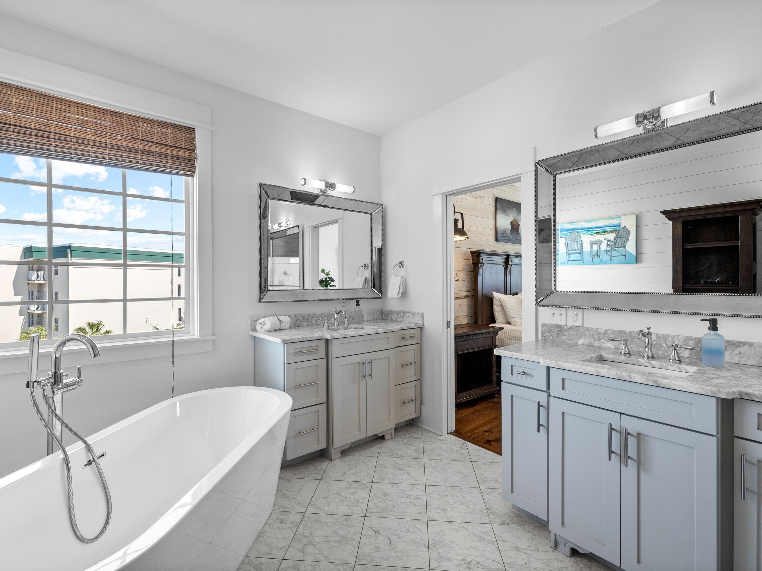 113 Dunes Estates Boulevard Santa Rosa Beach, FL 32459 - Photo 20 of 35 a bathroom with a granite countertop sink double vanity and a mirror