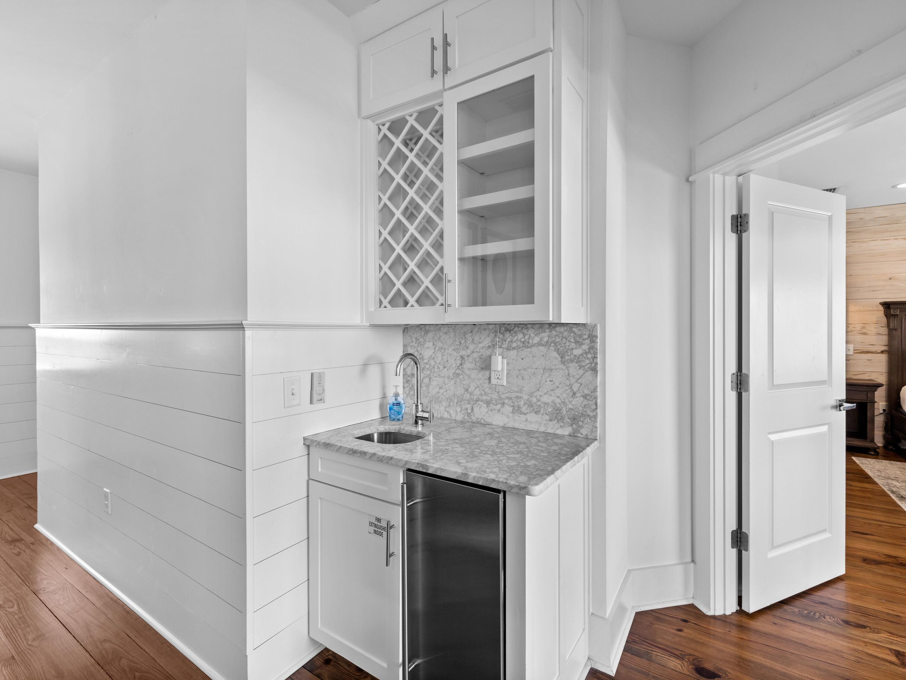 113 Dunes Estates Boulevard Santa Rosa Beach, FL 32459 - Photo 22 of 35 a bathroom with a sink and a mirror