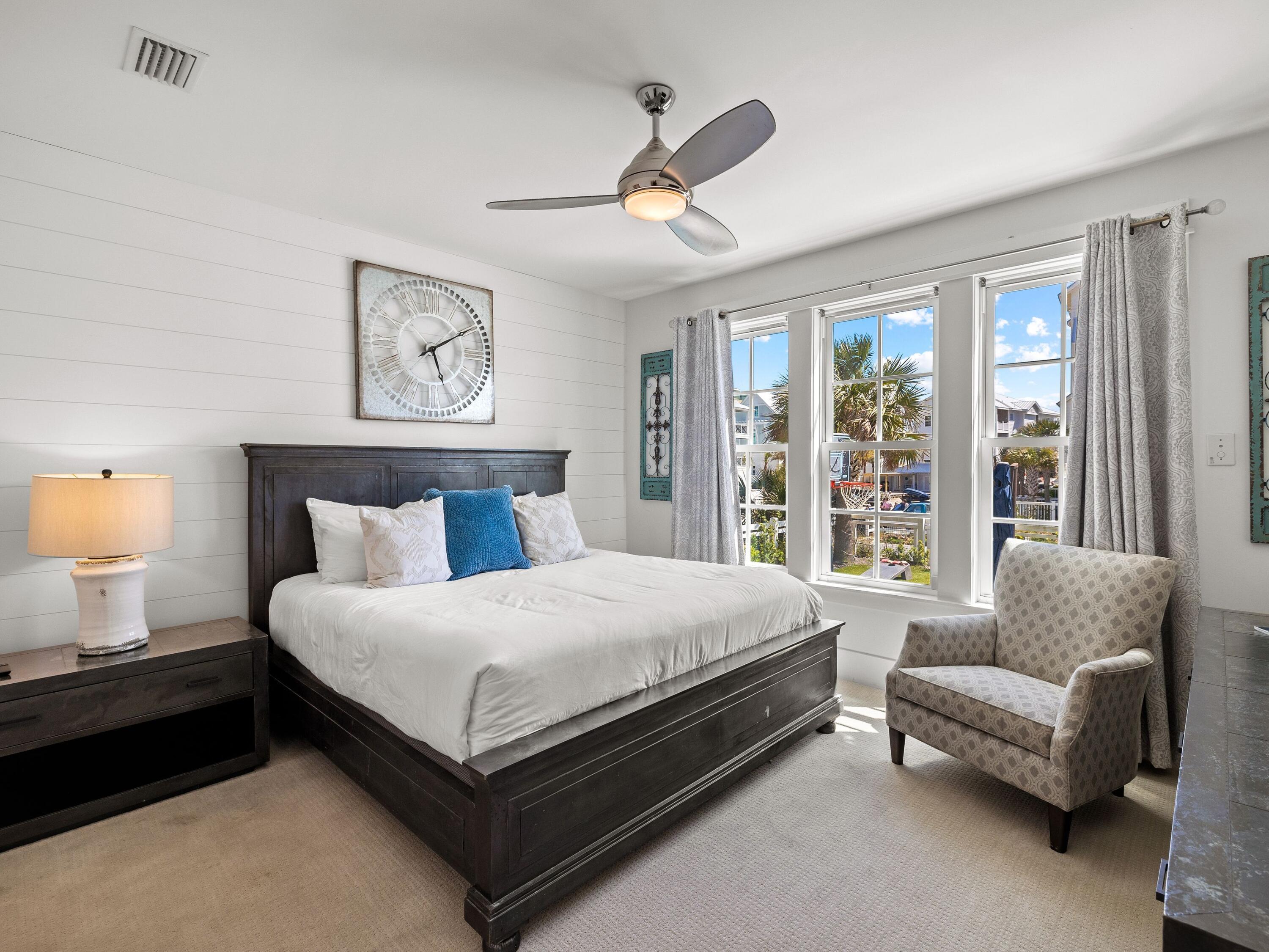 113 Dunes Estates Boulevard Santa Rosa Beach, FL 32459 - Photo 24 of 35 a bedroom with a bed couch and window