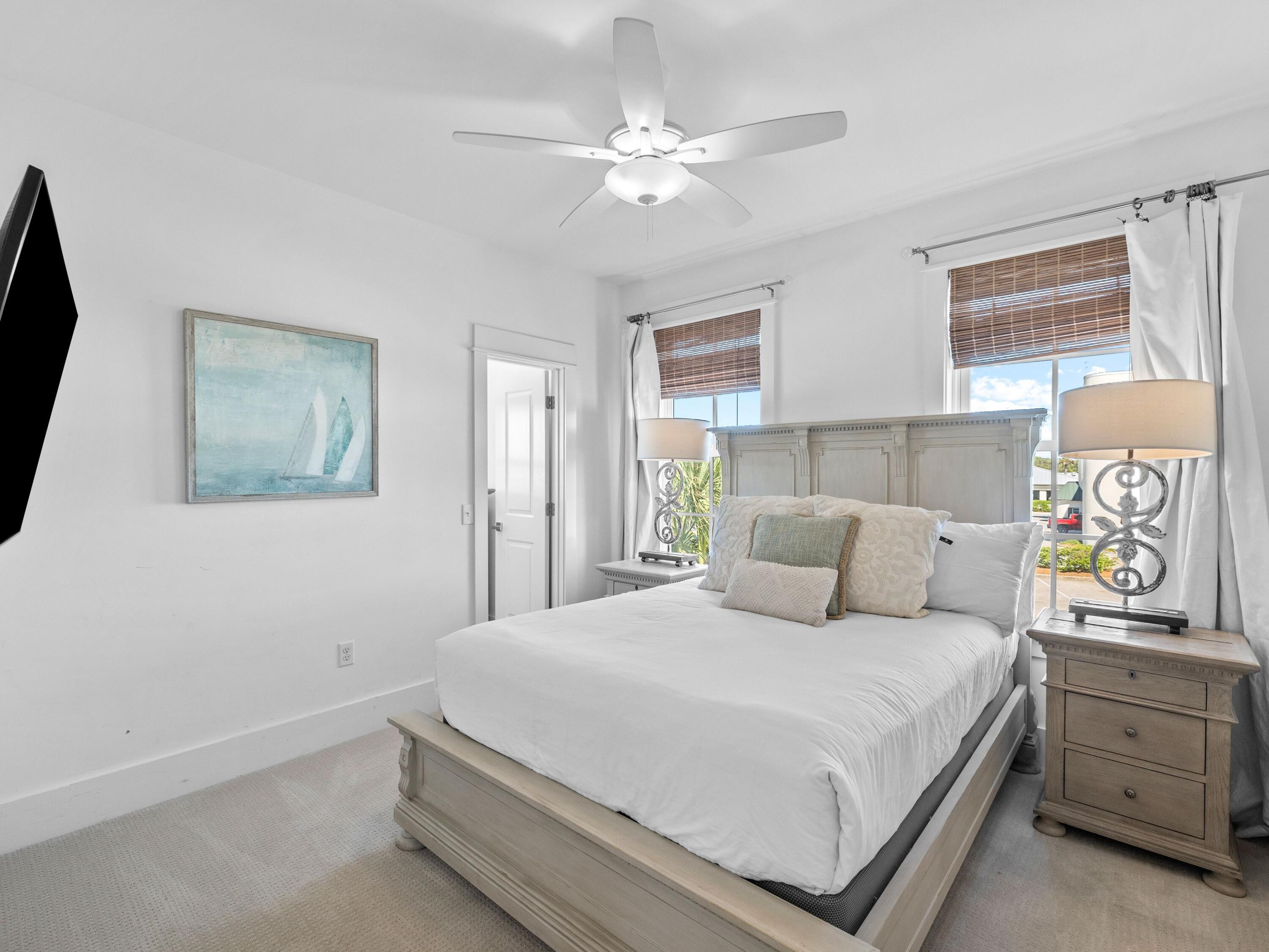 113 Dunes Estates Boulevard Santa Rosa Beach, FL 32459 - Photo 27 of 35 a bedroom with a bed and a window