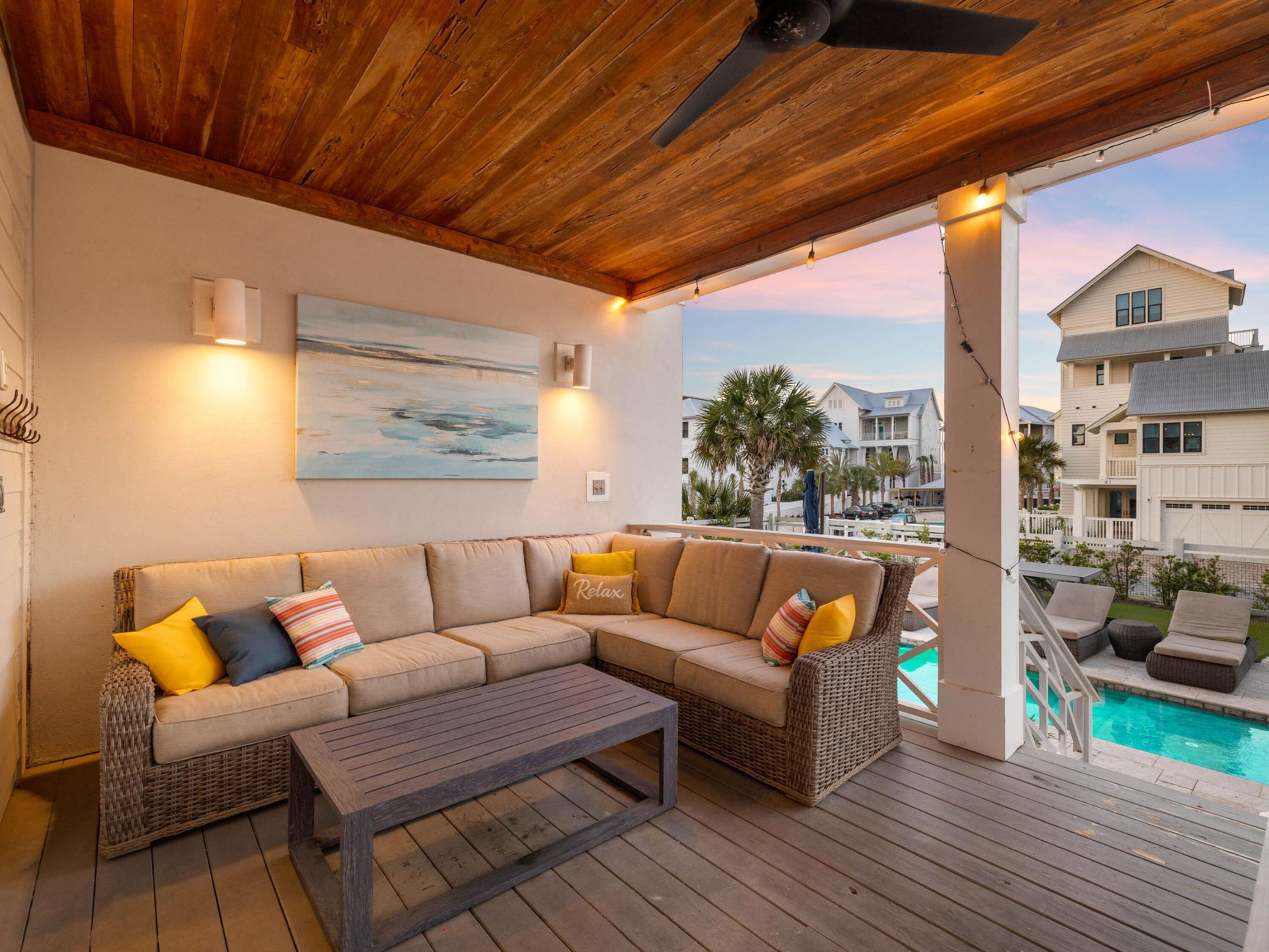 113 Dunes Estates Boulevard Santa Rosa Beach, FL 32459 - Photo 7 of 35 a roof deck with couch and chairs