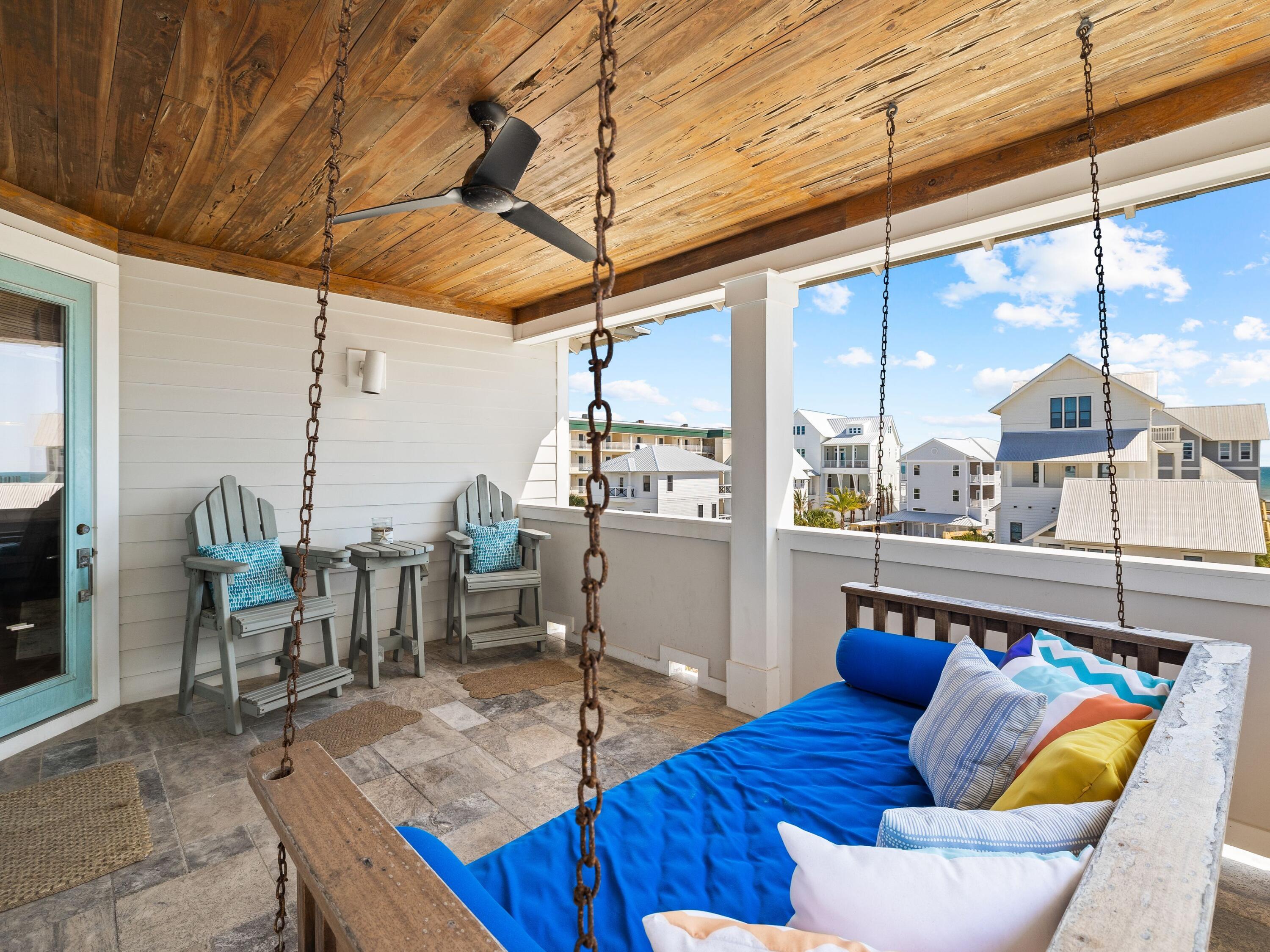 113 Dunes Estates Boulevard Santa Rosa Beach, FL 32459 - Photo 8 of 35 a living room with furniture and a floor to ceiling window