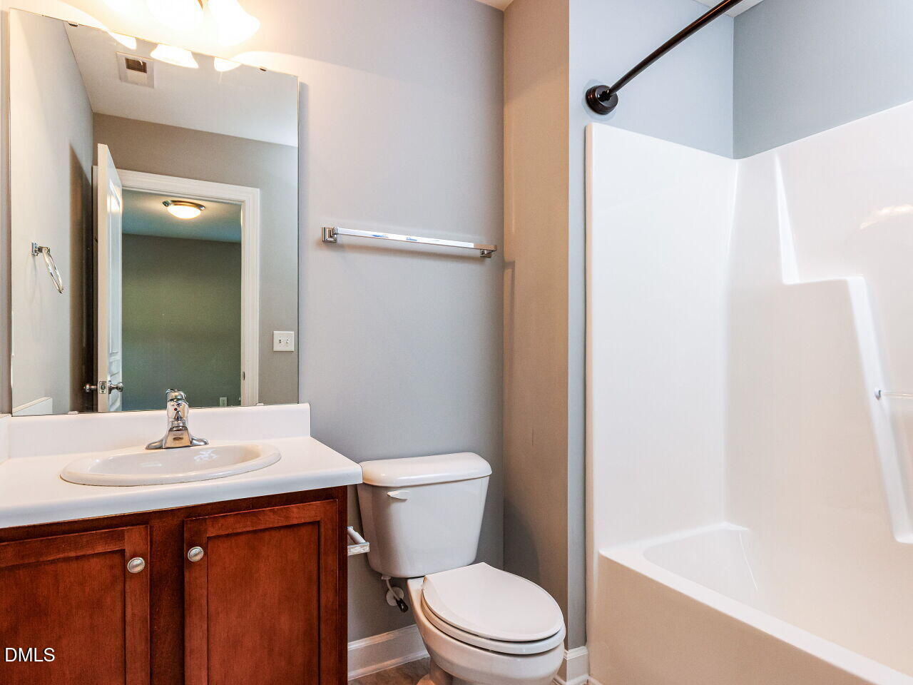 8729 Cypress Grove Run Raleigh, NC 27612 - Photo 20 of 41 a bathroom with a sink a toilet and shower