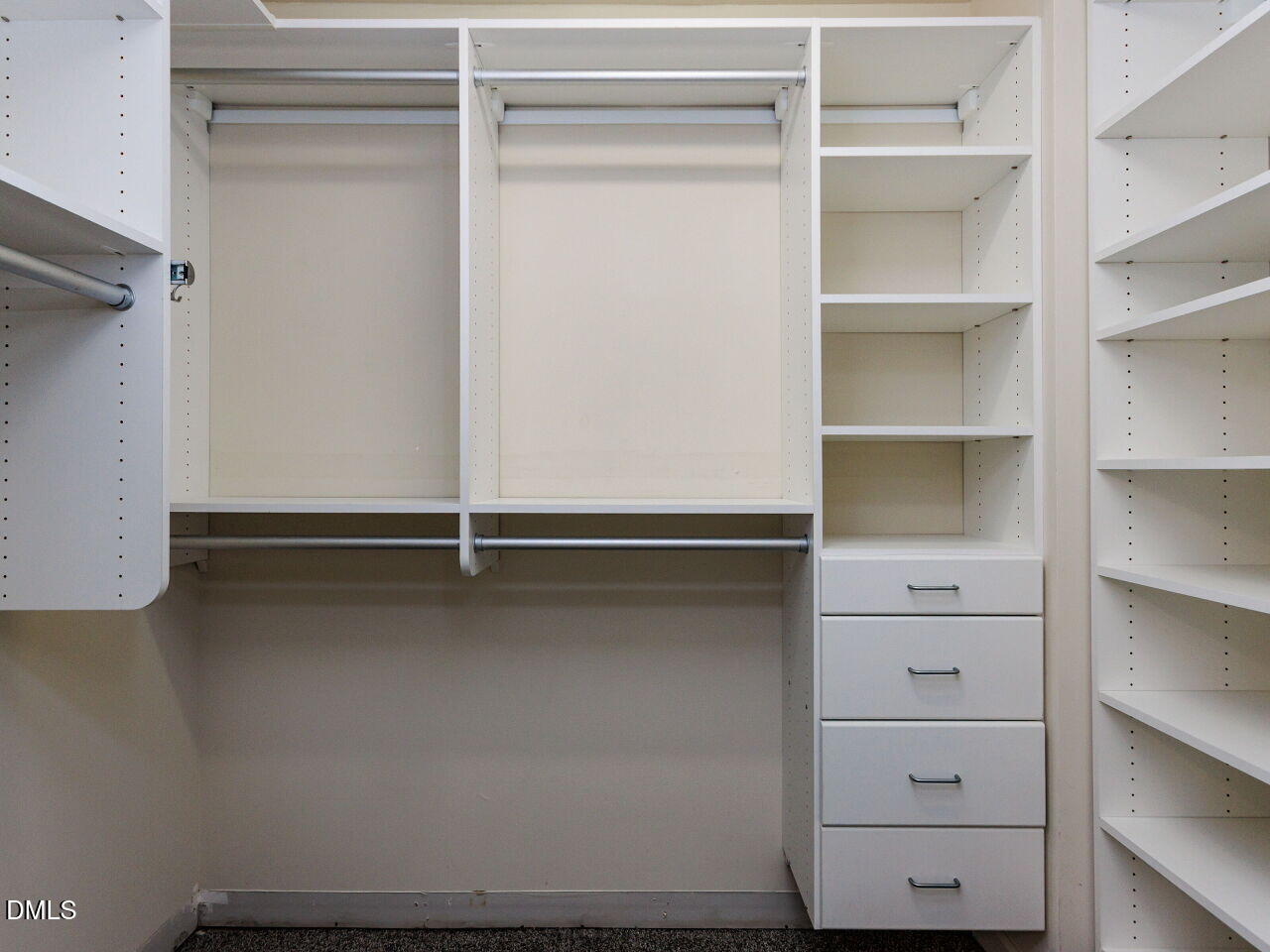 8729 Cypress Grove Run Raleigh, NC 27612 - Photo 26 of 41 a view of an empty walk in closet