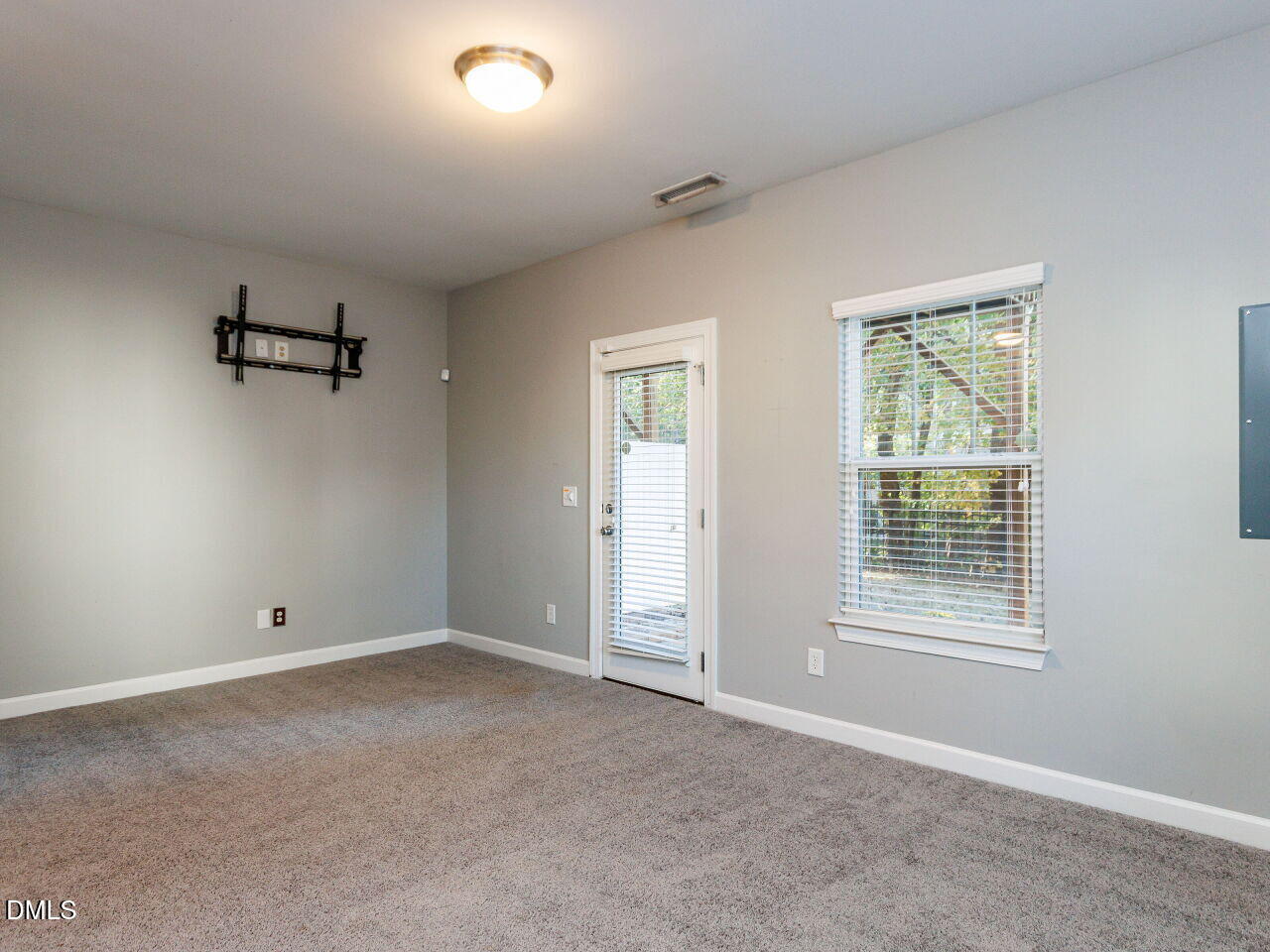 8729 Cypress Grove Run Raleigh, NC 27612 - Photo 28 of 41 an empty room with windows