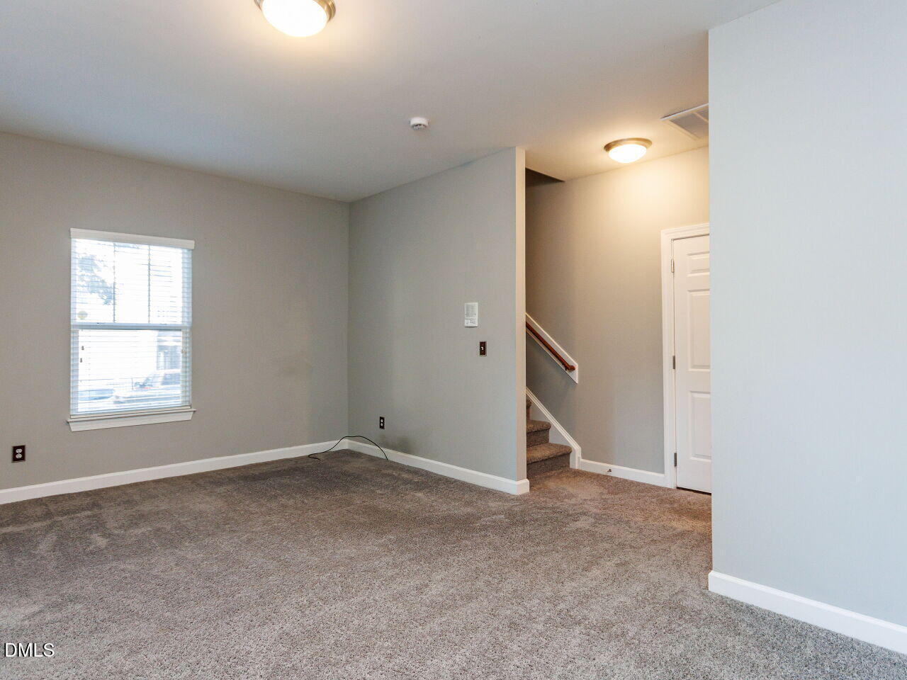 8729 Cypress Grove Run Raleigh, NC 27612 - Photo 29 of 41 an empty room with a natural light