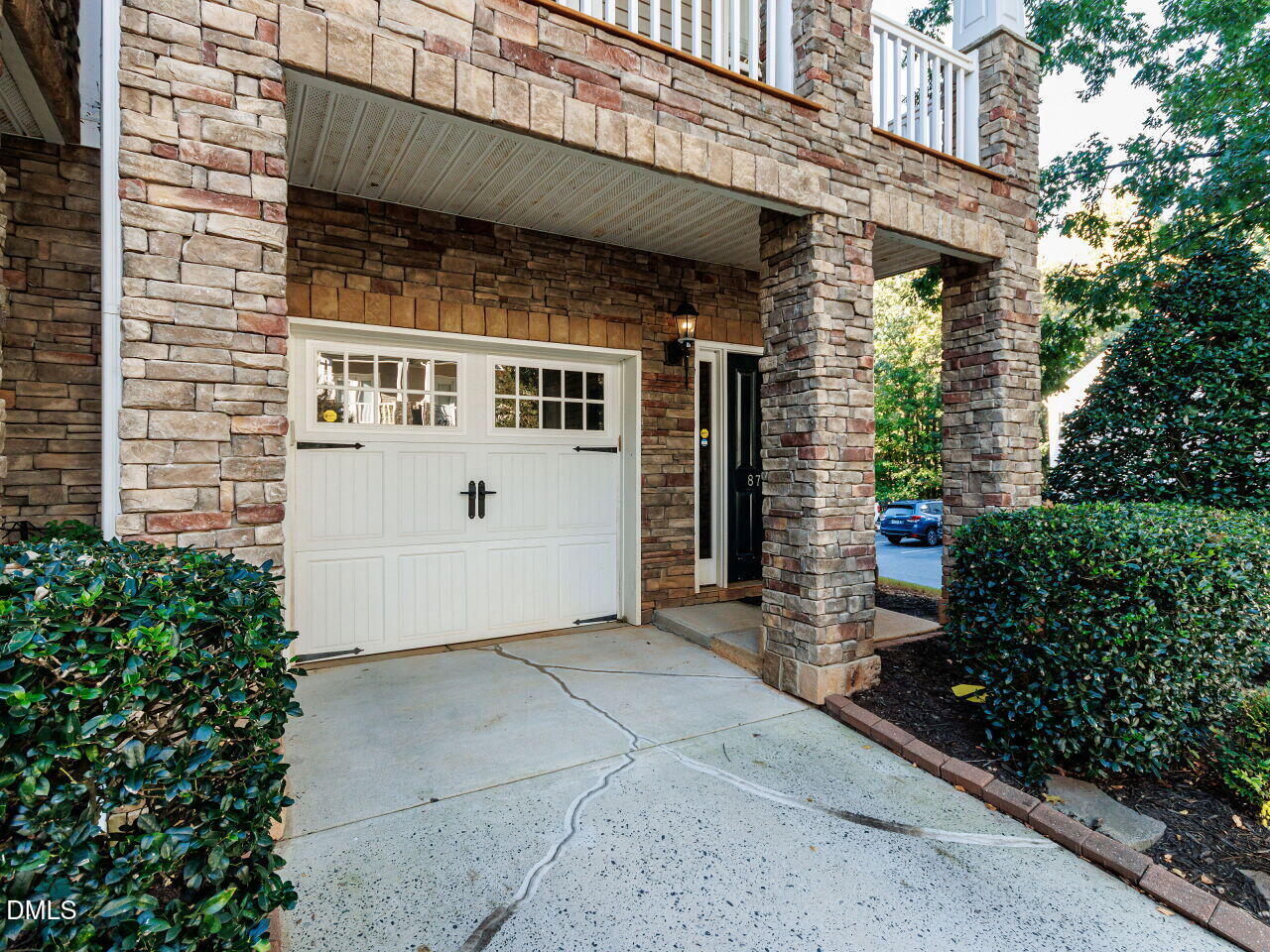 8729 Cypress Grove Run Raleigh, NC 27612 - Photo 3 of 41 a front view of a house with garden