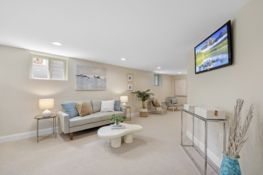 22 Jackson Road Medford, MA 02155 - Photo 27 of 40 a living room with furniture and a couch