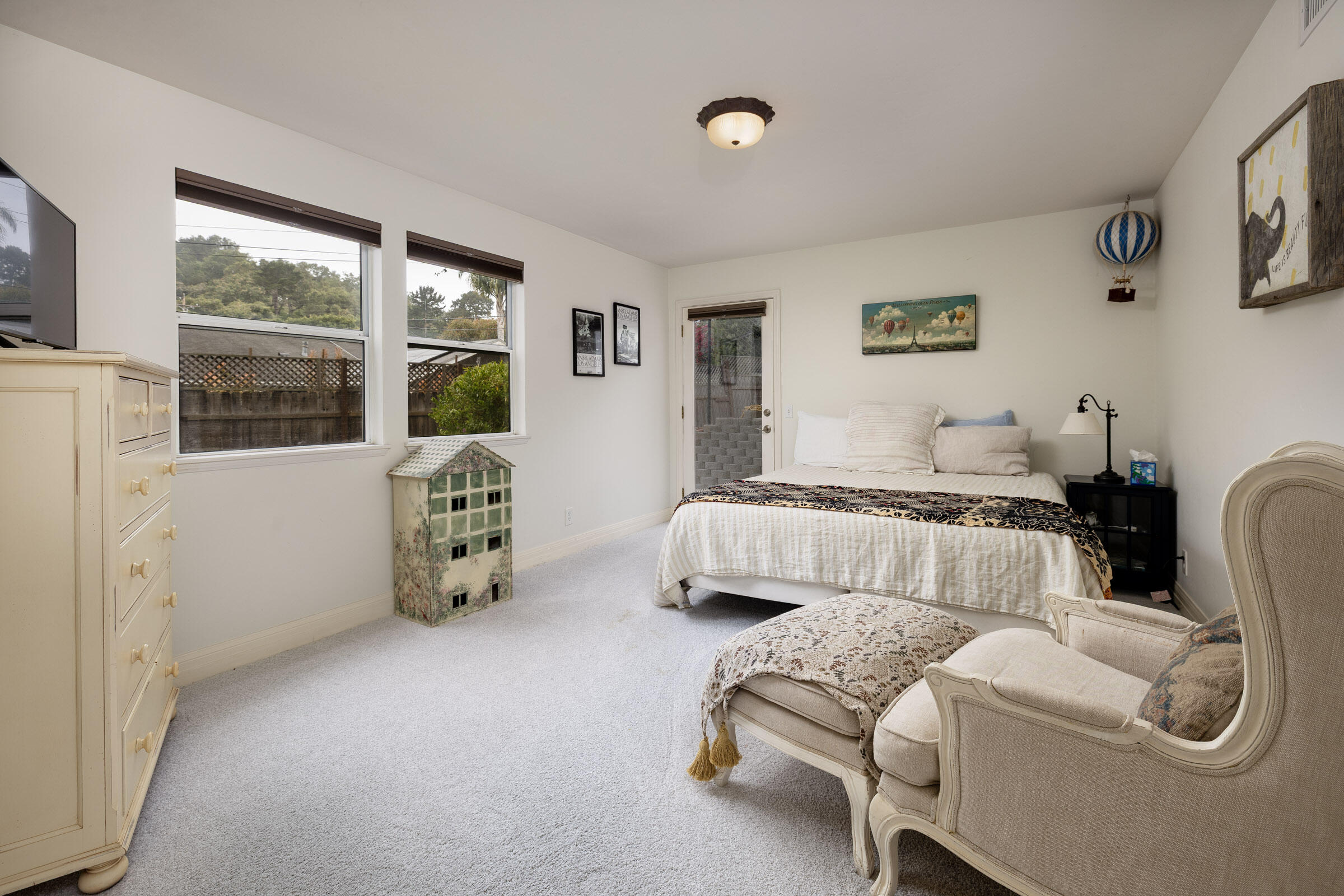 1352 Manitou Road Santa Barbara, CA 93101 - Photo 18 of 27 a bedroom with furniture and a large window