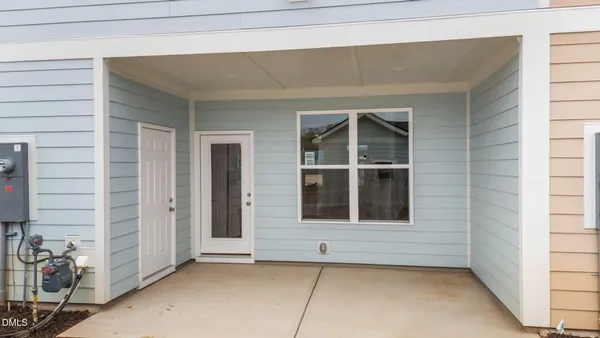 a view of a yard in front of a house