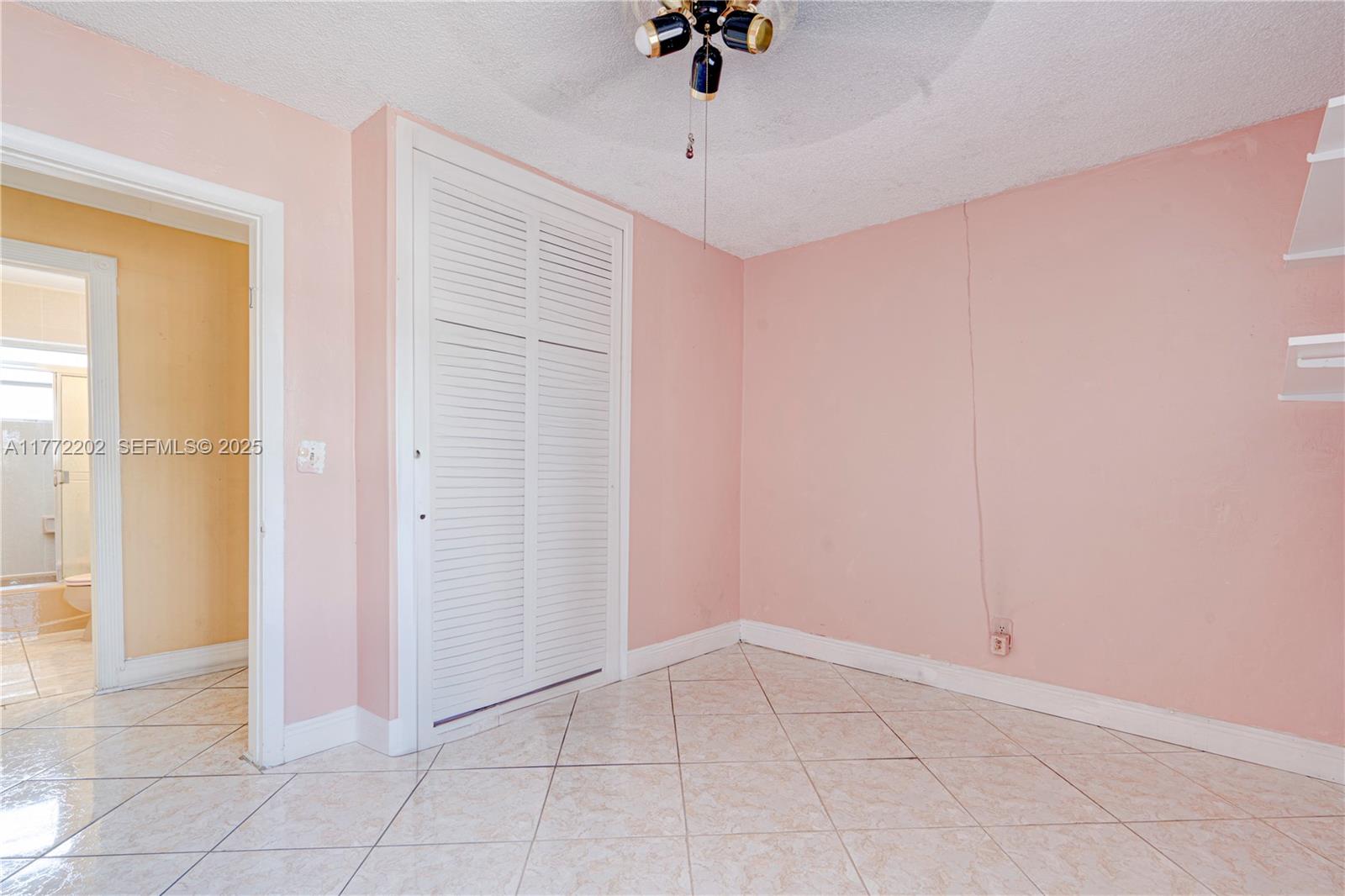390 East 44th Street Hialeah, FL 33013 - Photo 20 of 39 a view of an empty room with a window