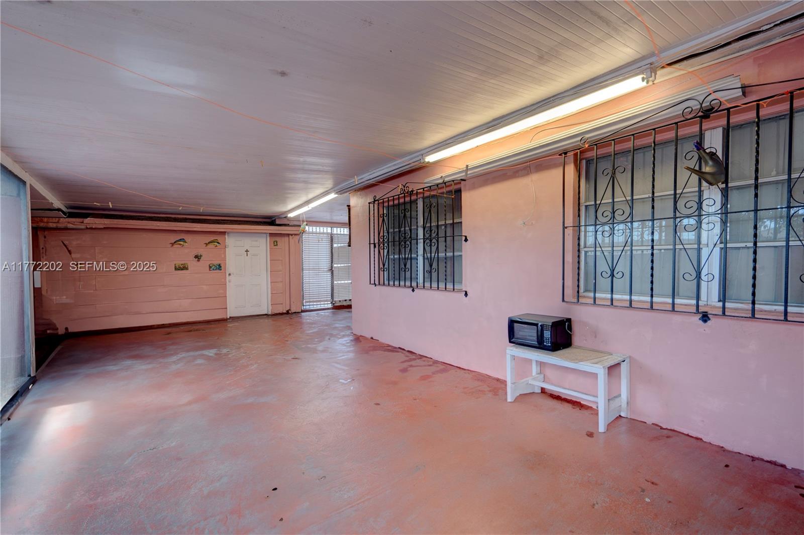 390 East 44th Street Hialeah, FL 33013 - Photo 25 of 39 a view of an empty room with window
