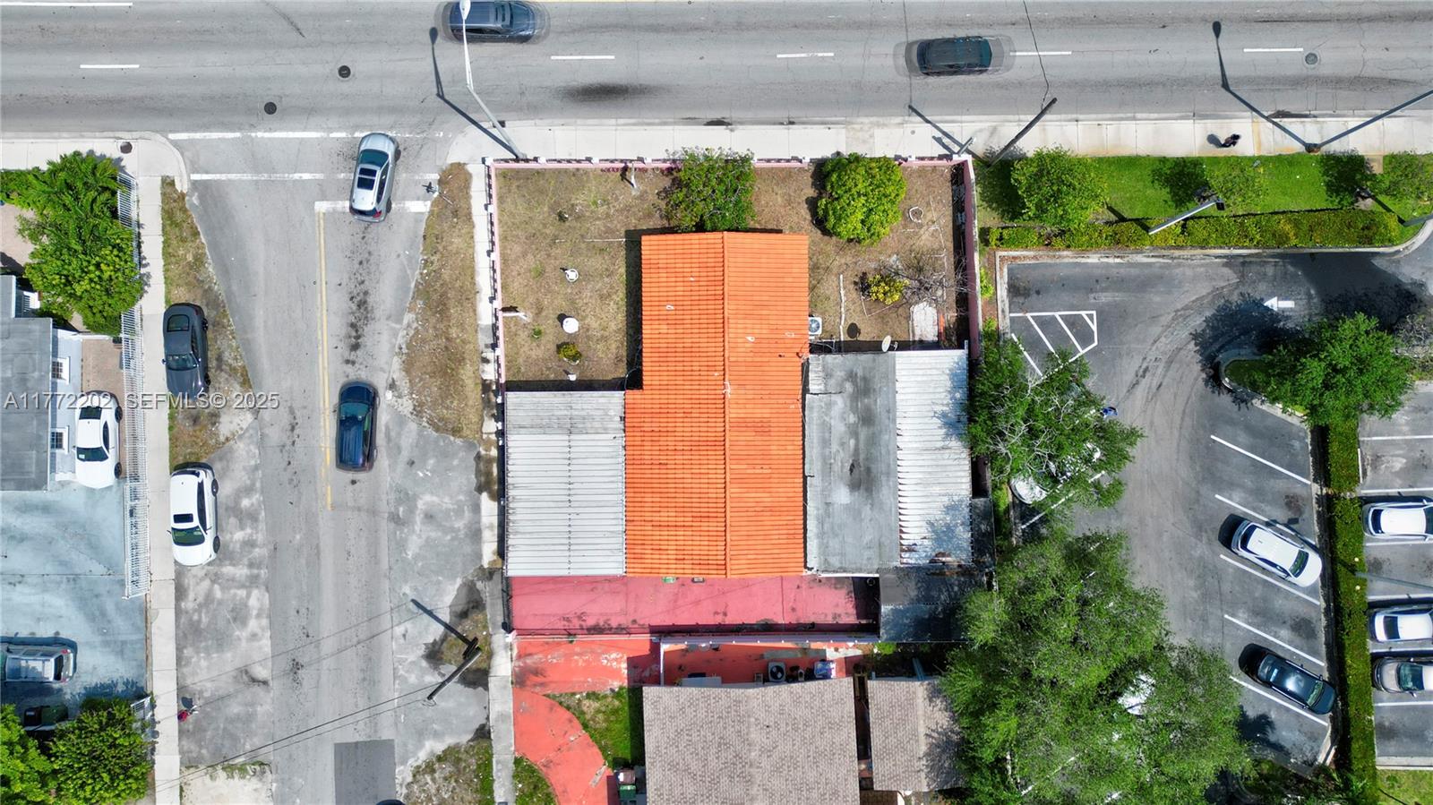 390 East 44th Street Hialeah, FL 33013 - Photo 35 of 39 a view of a house with a yard
