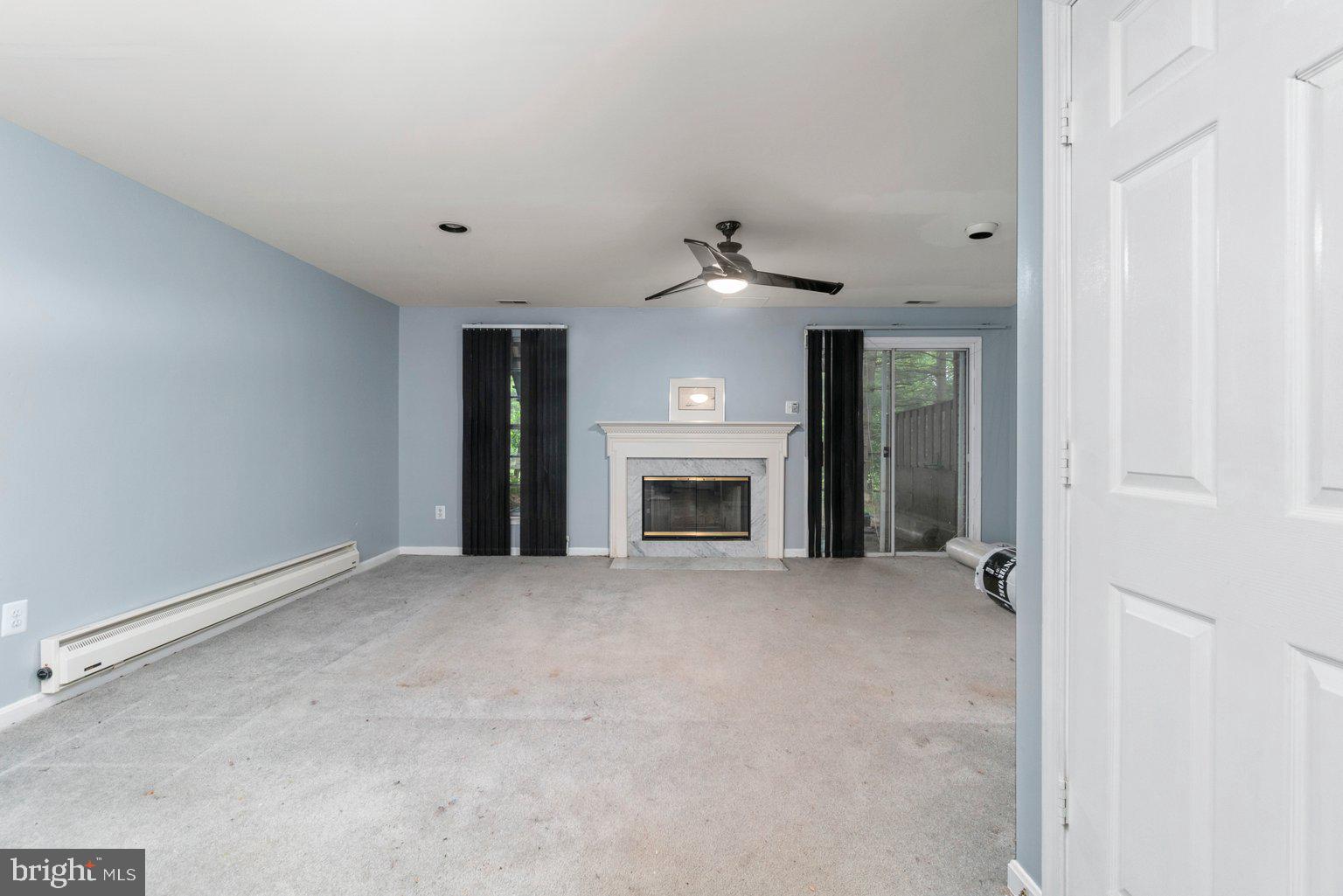 10940 Baskerville Road Reisterstown, MD 21136 - Photo 33 of 38 Lower level featuring fireplace
